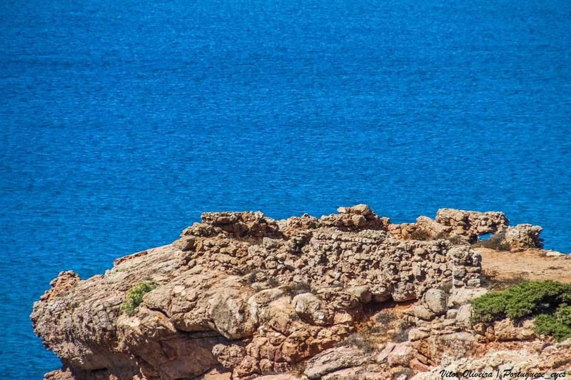 Ruins of the old fort and battery on the cliffs near Praia do Zavial