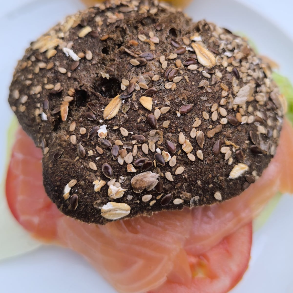 Traking Transfers Salmon Sandwich: fresh salmon, lettuce and tomato on dark seeded bread