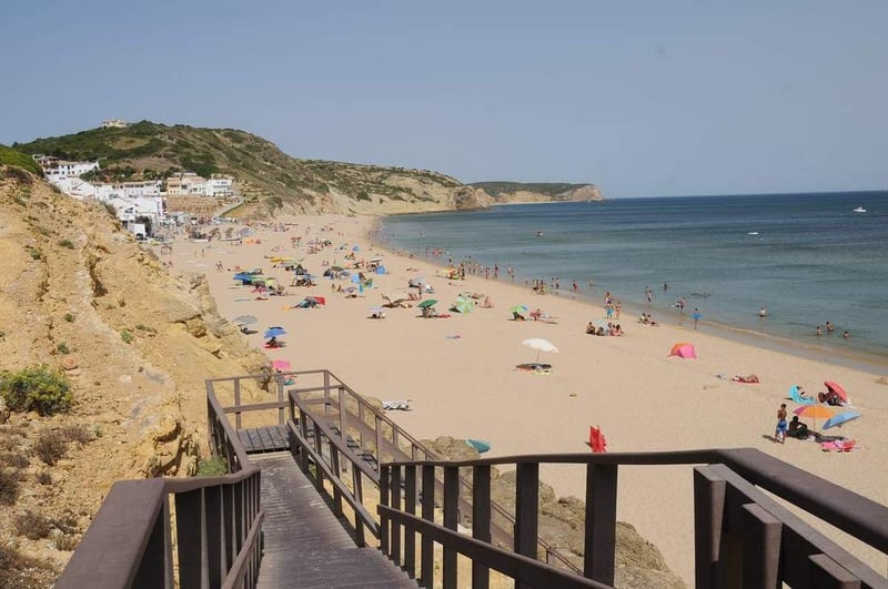 Praia da Salema seen from the wooden access stairs